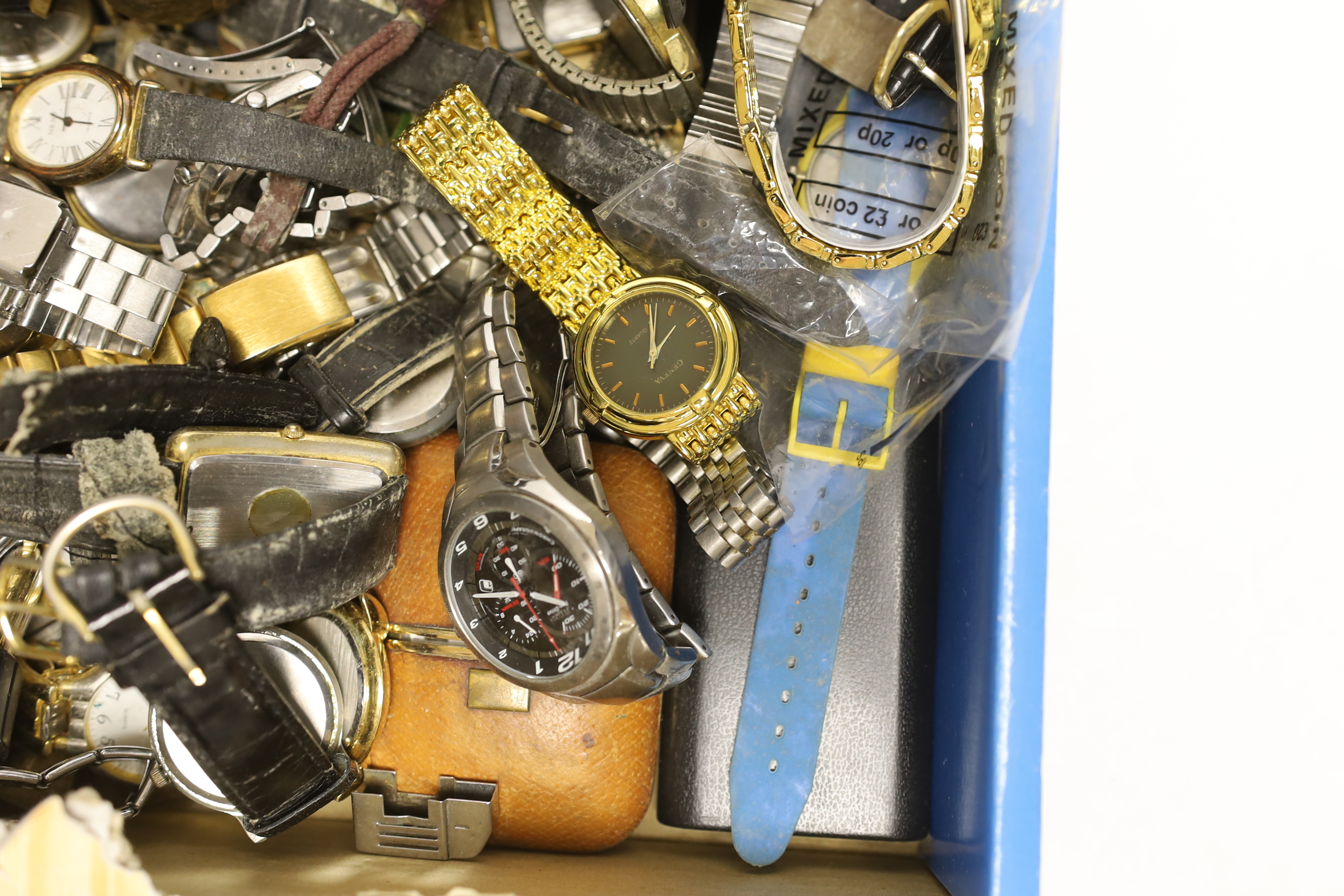 A collection of assorted modern wrist watches, including Seiko Sports, Lorus, Timex, etc.